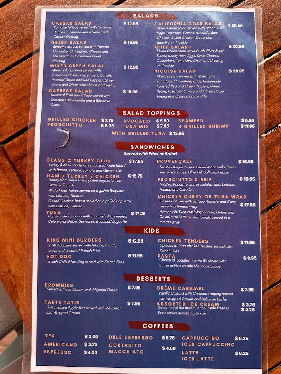 Printed menu with seafood and grill dishes